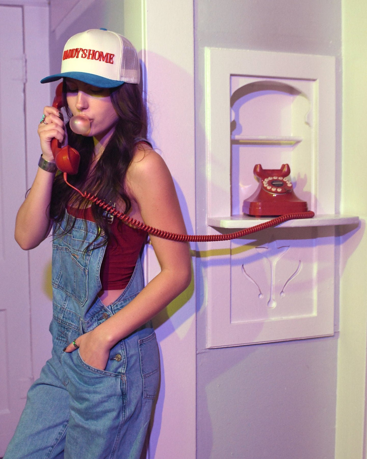Model wearing the Daddy's Home Austin red, white and blue hat